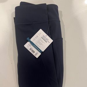 Athleta Stash Your Treasures Black Girl Leggings, size 12